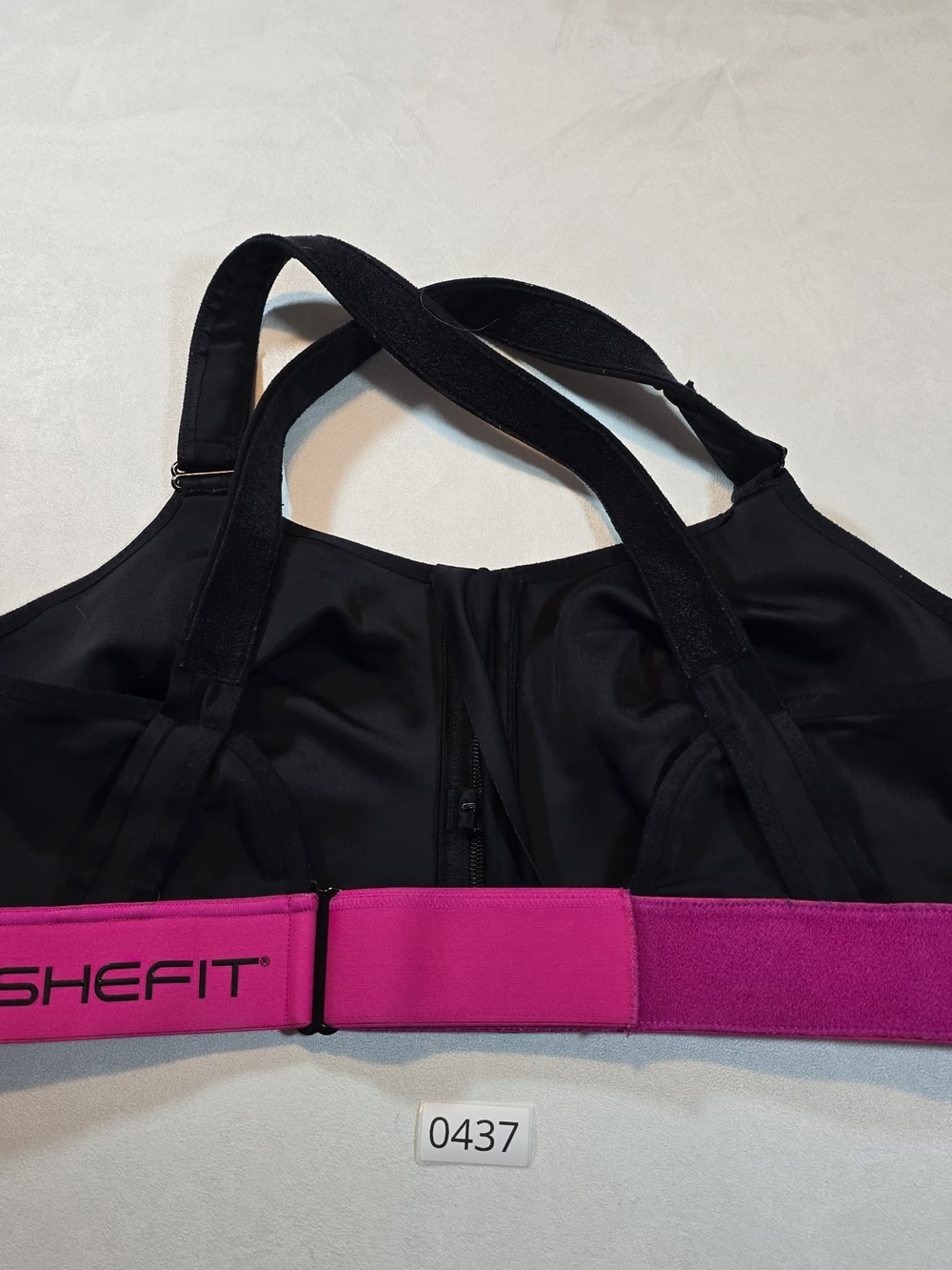 SHEFIT High-Support Black Sports Bra with Bright Pink Adjustable Band